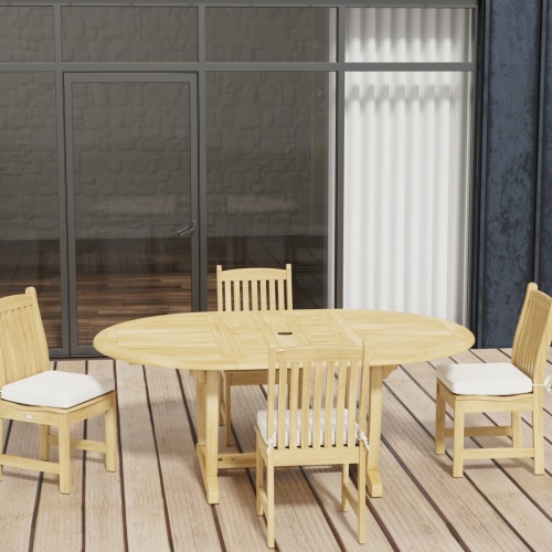 70031 Martinique Veranda 5 pc Dining Set of Martinique Oval Teak Table and 4 Veranda Side Chairs on wood deck with glass door and windows in background