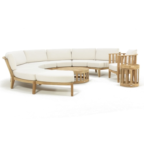 70864 Kafelonia Teak 7 pc Lounge Sofa Set angled view of 3 Kafelonia Sofa Sectionals a Backless Sofa Bench and a Barrel Chair and Coffee Table and Side Table on white background