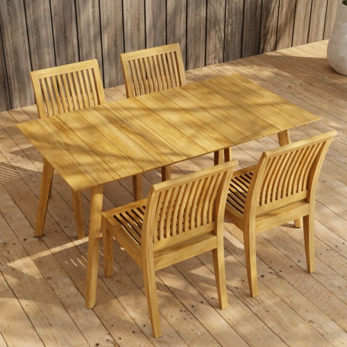 70571 Surf Laguna 5 pc Teak Dining Set of Surf Teak Rectangular Table and 4 Laguna Side Chairs angled aerial view on wood deck and a privacy wall in the background