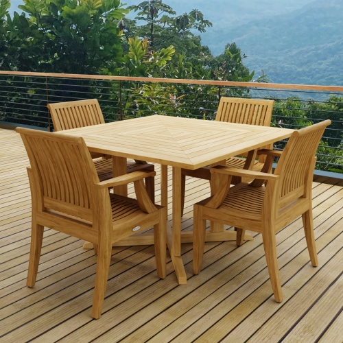 70904 Laguna Pyramid 5 pc Square Dining Set of Pyramid Square Table and 4 Laguna Armchairs angled corner view on wood deck with trees and blue sky in the background