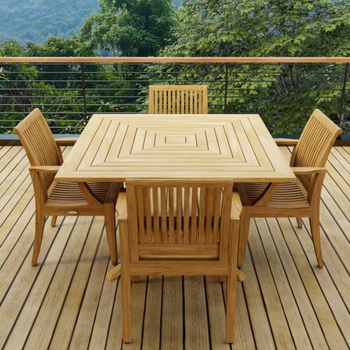 70904 Laguna Pyramid 5 pc Square Dining Set of Pyramid Square Table and 4 Laguna Armchairs angled side view on wood deck with trees and blue sky in the background