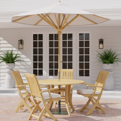 70043 Grand Hyatt Barbuda 5 pc Patio Dining Set with optional round umbrella angled side view on a brick patio with french doors and 2 ferns in the background