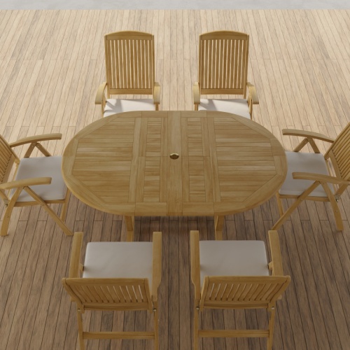 70367 Martinique Barbuda Recliner Dining Set of Martinique Teak Oval Dining Table and 6 Barbuda Reclining dining chairs with optional seat cushions angled aerial view on patio 