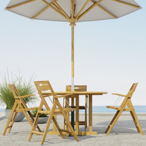 70376  Surf Barbuda 5 pc Folding Dining Set of 4 Surf folding Dining Chairs and a Barbuda 48 inch Round Table with optional opened umbrellas on outdoor terrace with the ocean in the background   