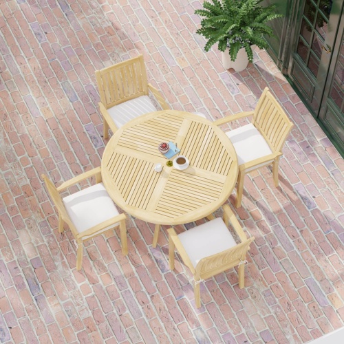 70027 Grand Hyatt 5 pc Dining Set on brick patio with optional seat cushions outdoors aerial view next to potted plant and glass entry door to the side