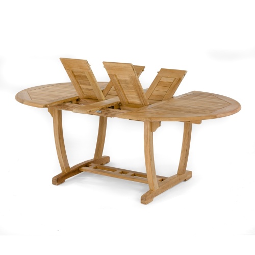 15548 Martinique Oval teak dining extendable table angled side view showing double butterfly leaf extensions folded outward in v on white background 