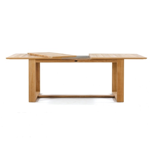 15548 Martinique Oval teak dining extendable table angled side view showing double butterfly leaf extensions folded outward in v on white background