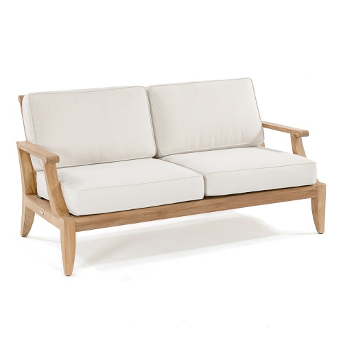 13152dp laguna teak loveseat with canvas colored cushions angled on white background