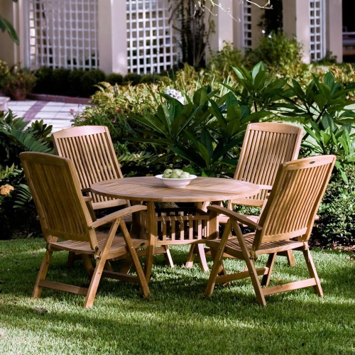 12569S Barbuda Recliner showing 4 around teak table on grass lawn with house and shrubs in the background